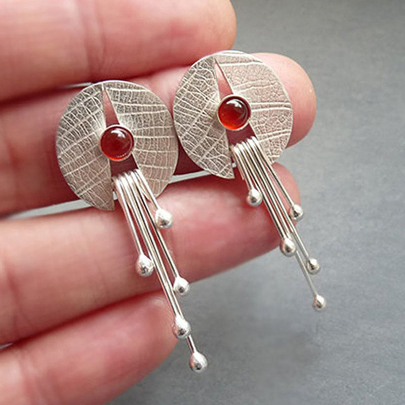 Handmade Artistic earrings in 925 sterling silver with rubies
