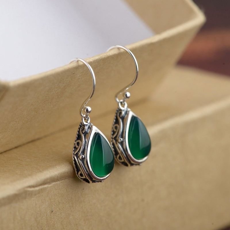 925 Silver dangling earrings with a handmade emerald style stone